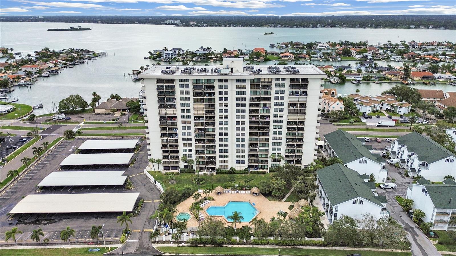 Experience coastal living at its finest in this beautiful 2-bedroom, 2-bath condo in the sought-after Starboard Tower on Island Way in Clearwater. Perfectly positioned on the 2nd floor, this home offers sweeping views of the resort-style pool and breathtaking sunsets — all visible from every room. Inside, the open floor plan is a spacious living area flooded with natural light and flows seamlessly into a well-appointed kitchen featuring ample cabinetry and the perfect layout for entertaining or casual meals. Both bedrooms are generously sized, providing peaceful retreats with serene views. The primary suite includes a large closet and a private ensuite bath with a walk-in shower. The condo includes a washer and dryer conveniently located in the unit making this condo move-in ready. Step out onto your private balcony to relax and enjoy the lush tropical landscaping and tranquil setting. Living at Starboard Tower offers more than a home — it’s a lifestyle. Residents enjoy a host of amenities including a sparkling heated pool, fitness center, and inviting community spaces. The building features controlled access for added security, along with dedicated parking for residents and guests. Located just minutes from world-famous Clearwater Beach, you'll have easy access to top-rated dining, shopping, and entertainment. Whether you're seeking a full-time residence or a luxurious vacation retreat, this condo offers the perfect blend of comfort, convenience, and resort-style living. Schedule your private tour today and see what makes this waterfront gem truly special.