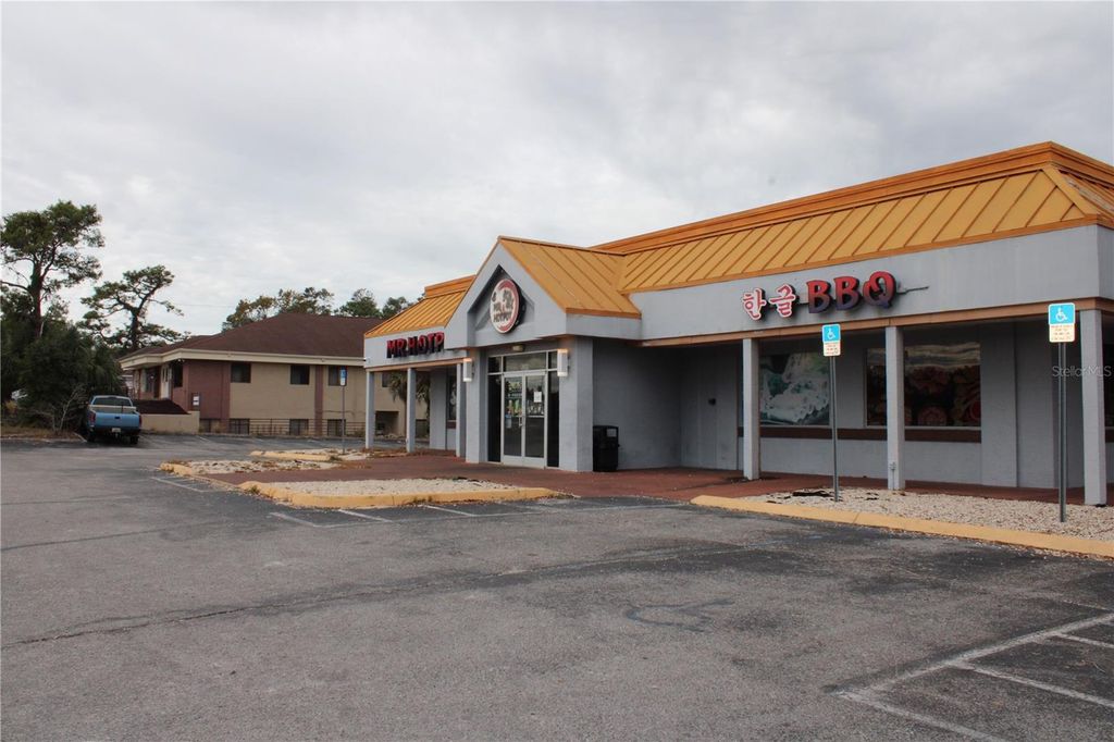 Photo of 5399 Commercial Way, Spring Hill, FL 34606 (MLS # W7880895)