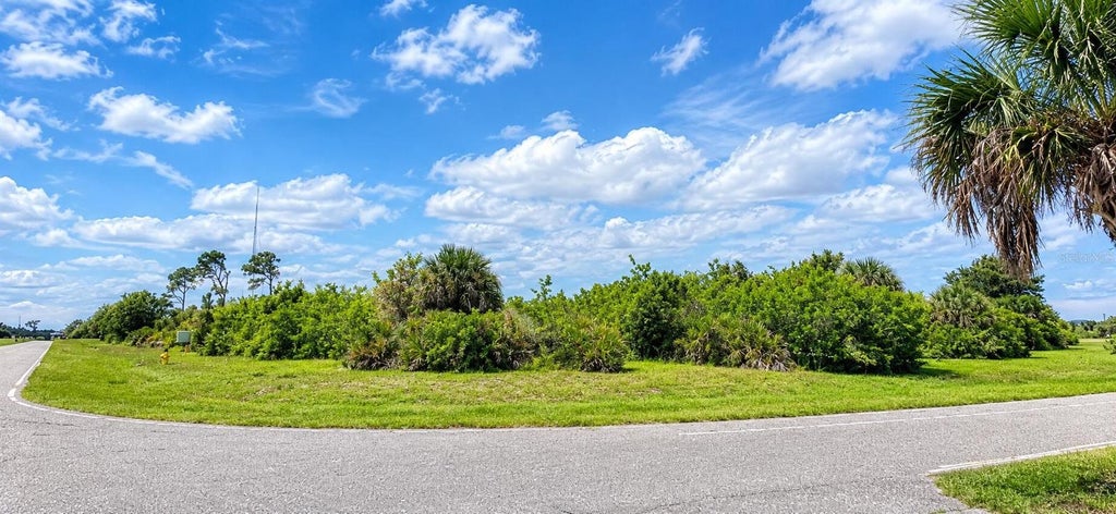 Photo of 317 Ingram Boulevard, Rotonda West, FL 33947 (MLS # O6453436)