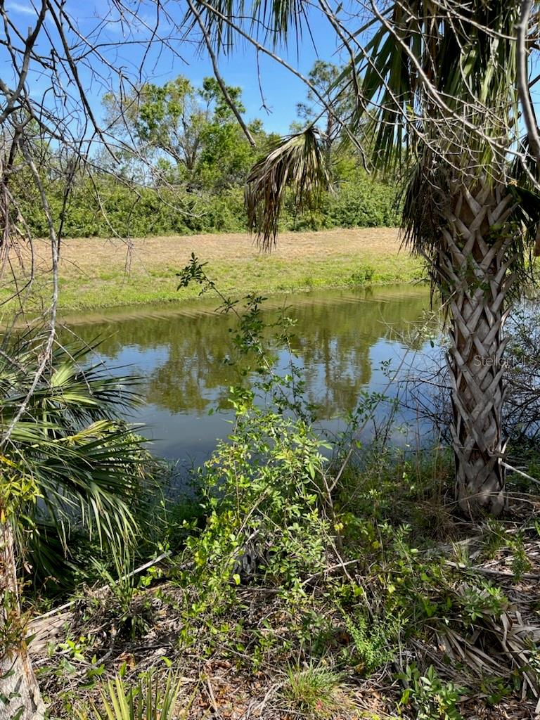 What a great opportunity to own over a half of an acre on a beautiful fresh water canal, no HOA and no CDD fees. Beautiful lot in North Port. North Port is an area that has seen major growth in the past few years and is convenient for those looking to commute to Sarasota or Fort Myers. The City of North Port offers so many community highlights including a new Water Park, Atlanta Braves Spring Training Stadium, shopping, dining, plenty of public parks, and less than a 30 minute drive to pristine Gulf Coast Beaches! Don't miss this one; Drive by and make your offer today!