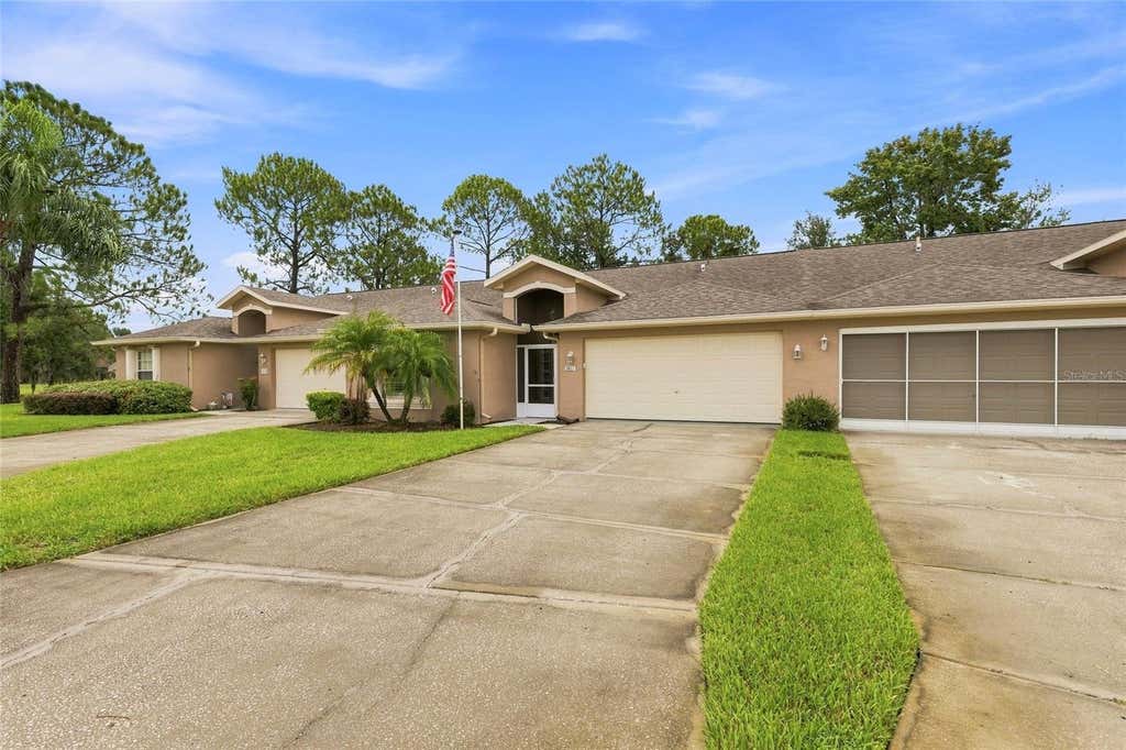 Photo of 7411 Moorgate Court, New Port Richey, FL 34654 (MLS # W7888065)