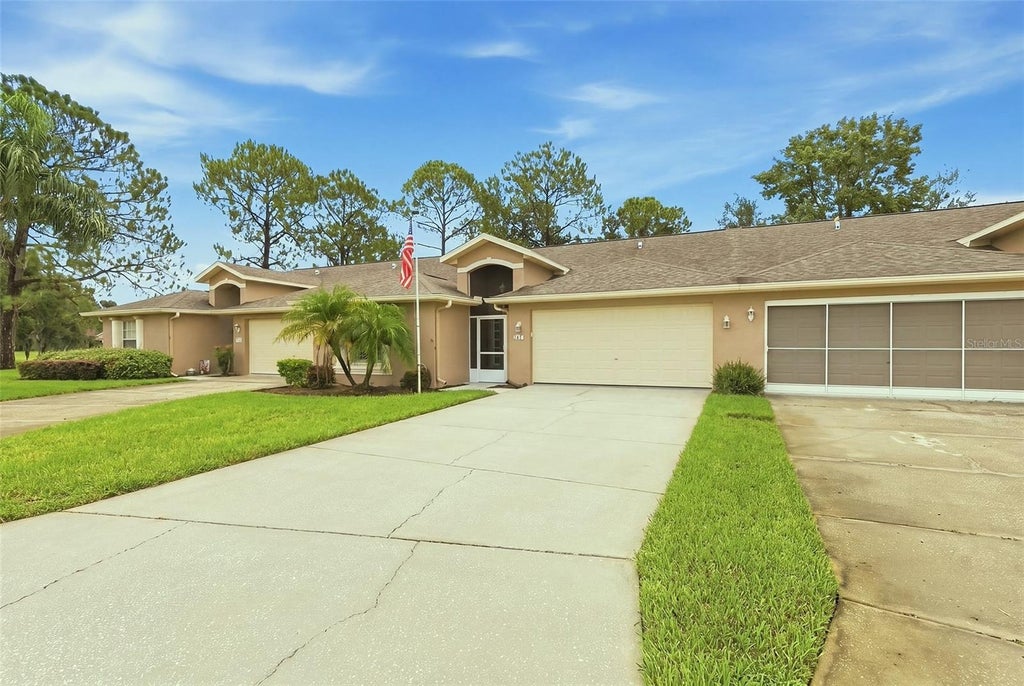 Photo of 7411 Moorgate Court, New Port Richey, FL 34654 (MLS # W7888065)