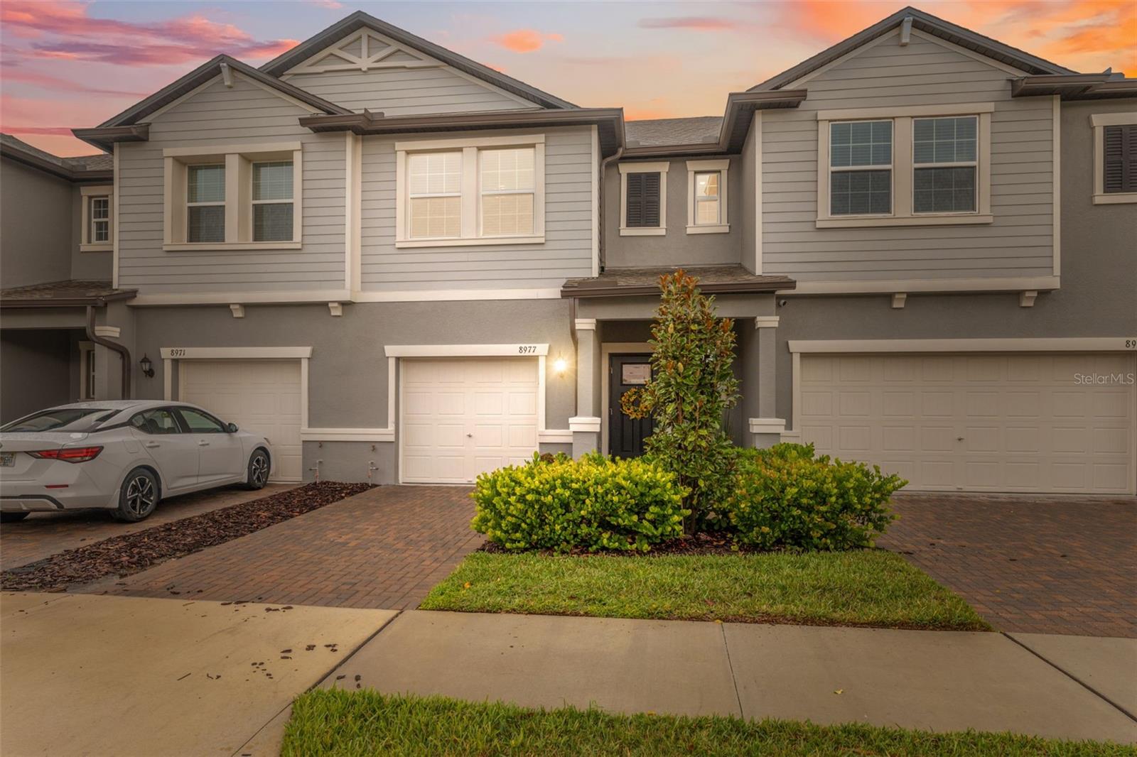 Welcome to your Lennar townhome in the highly sought-after, master-planned community of Connerton! This beautiful 3-bedroom, 2.5-bath home features a bright and open floor plan, including a spacious loft upstairs — perfect for a home office, media room, or play area. Enjoy serene water views from the screened-in lanai, or relax on the charming front porch. The home also includes a one-car garage for added convenience. Residents of Connerton enjoy a vibrant lifestyle with access to resort-style amenities, including two pools — one with a splash park and the other a competitive lap pool — as well as multiple sports courts, miles of scenic trails for walking, jogging, or biking, and an onsite elementary school. Don’t miss your chance to live in this exceptional community!