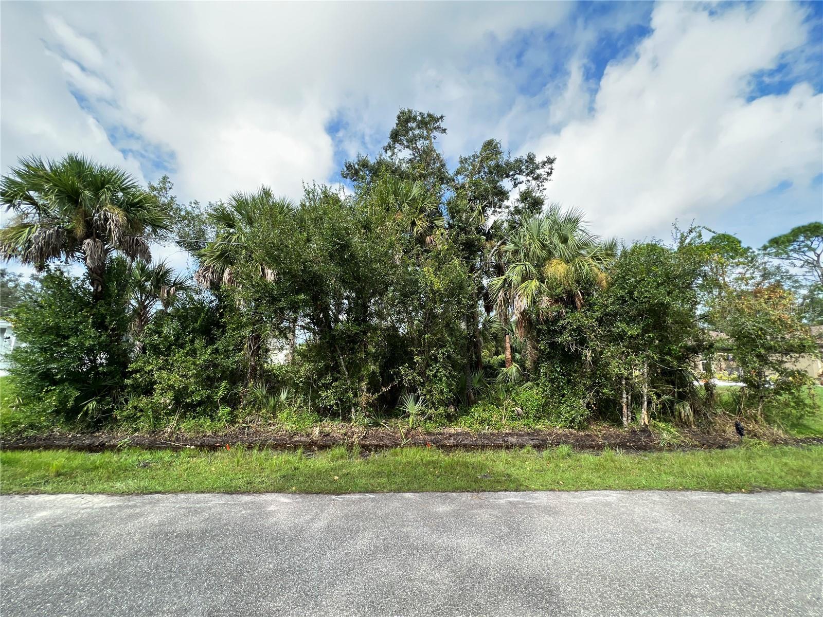 Unlock the potential of this prime, buildable land in the heart of North Port! This nearly one-quarter acre canvas offers the perfect blend of city convenience and suburban tranquility. Set against a backdrop of newer construction homes on a delightful street, this property is a promising foundation for your dream home. Location matters, and here, you're in the hub of it all. Enjoy easy access to shopping, dining, and medical facilities, streamlining your daily life. Commuters will appreciate the proximity to the interstate, making travel a breeze without sacrificing the serenity of suburban living. The close proximity to schools ensures that education is within easy reach while nature enthusiasts can explore the nearby Blue Ridge Park for leisure and outdoor activities. This is more than just land; it's an opportunity to craft the lifestyle you desire. Your dream home begins here in North Port, where convenience meets community. Don't miss out on this promising canvas for your future!