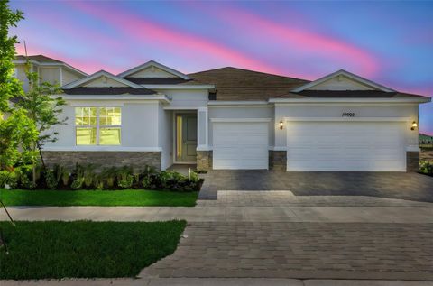 Photo of 10693 NW Suncrest Loop, Port Saint Lucie, FL 34987 (MLS # G5111278)