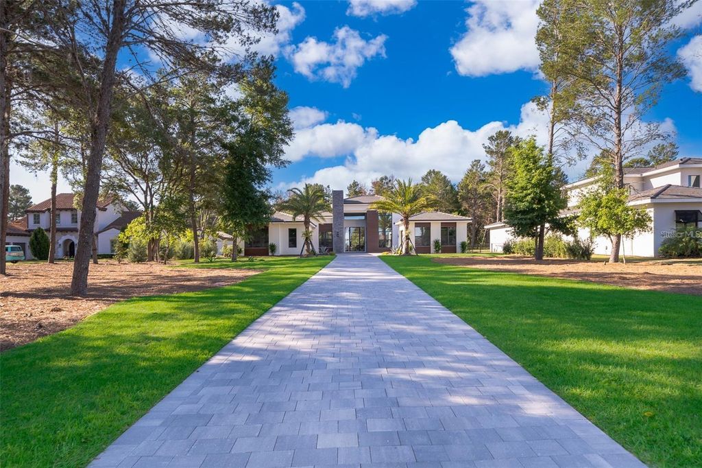 Photo of 15210 Pendio Drive, Montverde, FL 34756 (MLS # O6397409)