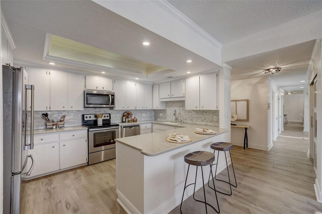 Photo of 6 Belleview Boulevard #101, Belleair, FL 33756 (MLS # TB8510910)