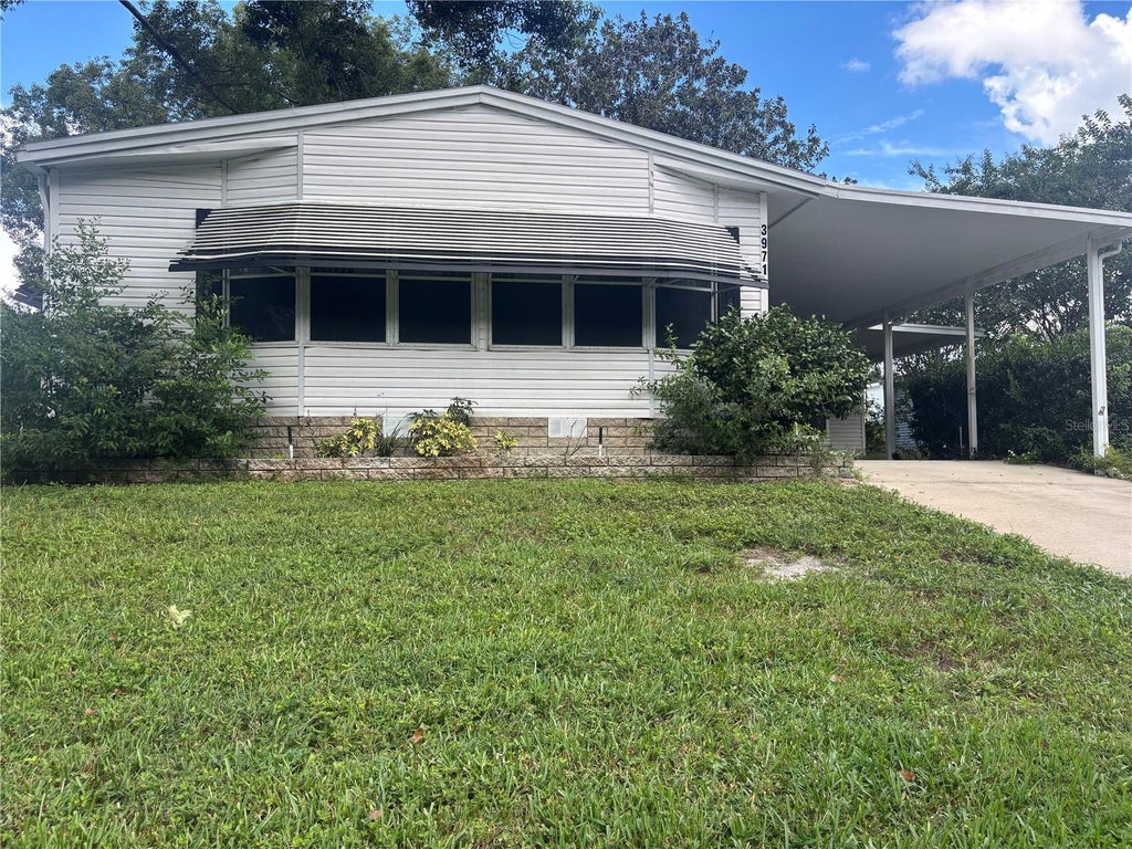 Photo of 3971 Cohen Drive #739, Zellwood, FL 32798 (MLS # O6443849)