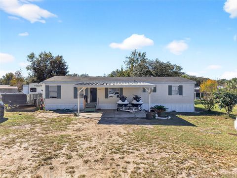 Photo of 6766 NE 1st Place, Ocala, FL 34470 (MLS # OM713153)