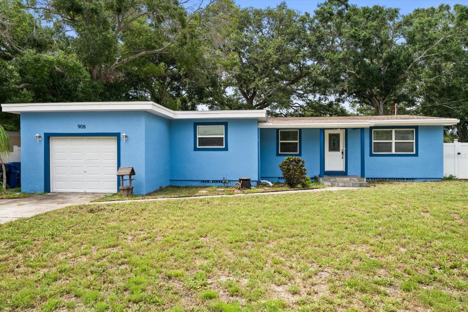 3 bedroom, 1.5 bath home in Prime Largo Location! Welcome to this well-maintained single family home, perfectly nestled in a quiet, sought-after Largo neighborhood. With timeless original hardwood floors and modern updates where it counts, this home blends character and convenience. Step inside to find a bright and functional kitchen featuring granite countertops, stainless steel appliances and ample cabinet space - ideal for both everyday living and entertaining. The spacious living area offers warmth and comfort, while the three well-sized bedrooms provide flexibility for family, guests or a home office. Enjoy peace of mind with a new roof installed in 2020 and relax knowing the home is not in a flood zone. The large fenced-in backyard with durable vinyl fencing is perfect for pets, play or weekend BBQs. A one-car garage adds extra storage and convenience, and the washer and dryer are included. Located just minutes from Largo Central Park, Largo Public Library, Largo Mall and the stunning Gulf beaches. Available 10/15/25.