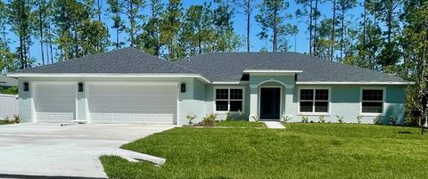 Photo of 45 Laguna Forest Trail, Palm Coast, FL 32164 (MLS # FC309015) Photo of 45 Laguna Forest Trail, Palm Coast, FL 32164 (MLS # FC309015)