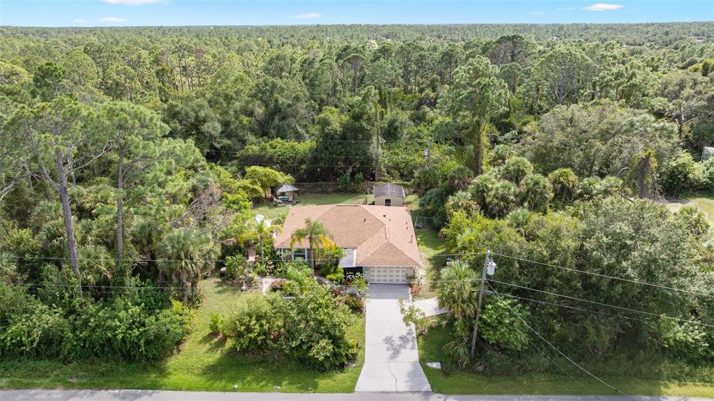 Photo of 13121 Ketridge Avenue, Port Charlotte, FL 33953 (MLS # C7516256)