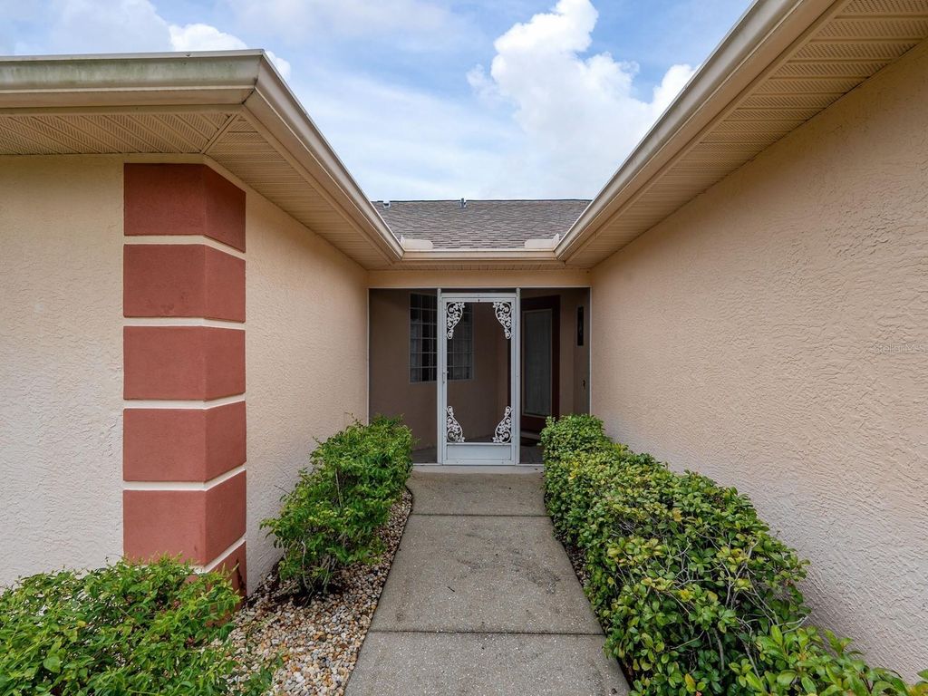 Photo of 227 Cougar Way, Rotonda West, FL 33947 (MLS # A4662414)