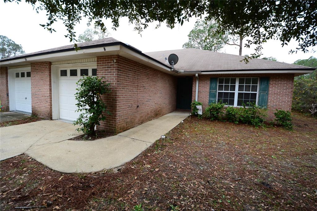 Photo of 35 Regent Lane #B, Palm Coast, FL 32164 (MLS # FC317460)