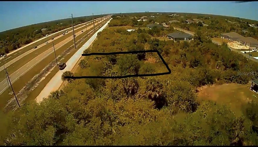 Exceptional opportunity to own a 10,000 sq. ft. lot (80x125) with versatile OMI (Office, Medical, Institutional) zoning. This high-visibility site on N Access Rd is perfect for a custom professional office, medical clinic, or institutional use. Located in a rapidly growing area of Port Charlotte with easy access to Englewood and North Port. Not in a deed-restricted area (No HOA). Buyer to verify all building requirements and potential for residential use with Charlotte County Zoning. Secure your business's future home today!