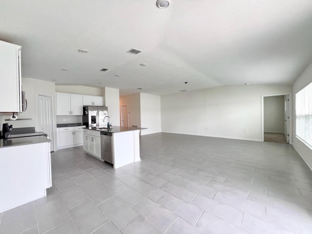 Photo of 1950 Pond Pine Court, Haines City, FL 33844 (MLS # S5149483)