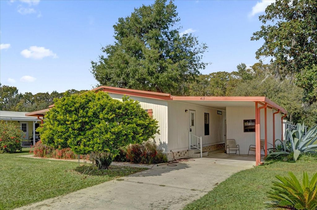 Photo of 415 S Timber Trail, Wildwood, FL 34785 (MLS # O6392964)