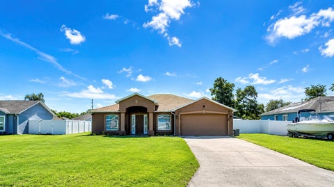 Photo of 3190 Ambassador Avenue, Spring Hill, FL 34609 (MLS # W7888427)