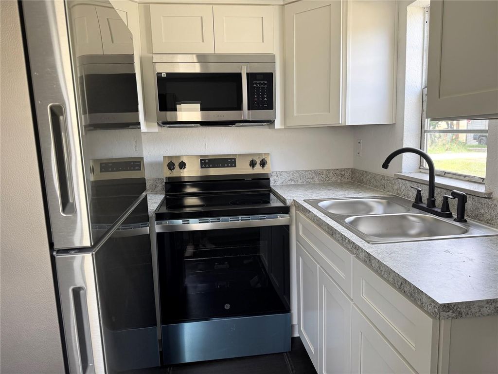 Photo of 622 Booker Avenue #A B, Lake Wales, FL 33853 (MLS # L4956356)