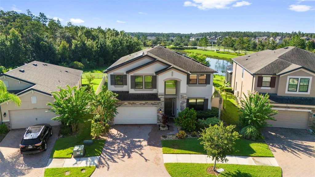 Photo of 10721 Pleasant Knoll Drive, Tampa, FL 33647 (MLS # TB8422233)