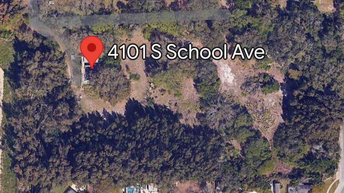 Prime Development Opportunity in Sarasota – 4.77± Acres with Approved PUD-3 Zoning Presenting a rare and exceptional opportunity for builders and developers in the heart of Sarasota. Located at 4101 and 4103 South School Avenue, this expansive 4.77± acre double-parcel property is perfectly positioned adjacent to the newly redeveloped Bath and Racquet Club, placing it at the edge of one of Sarasota’s most exciting and dynamic corridors. This property is pre-approved for up to 4.5 units/acre, allowing for a thoughtfully designed 21-home concept plan. The proposed layout includes a private, gated road, lush green space and parkland, and offers building heights up to 55 feet,
providing flexibility for both expansive single-family homes or creative design alternatives. Multiple configuration options are available, including a refined 18-unit estate lot plan, offering developers versatility in tailoring the final vision to market demand. This location provides unmatched accessibility to downtown Sarasota, A-rated schools, award-winning beaches, fine dining, boutique shopping, St. Armands Circle, Longboat Key, and major thoroughfares like I-75—all while maintaining a tranquil residential atmosphere. Whether you envision a luxurious gated enclave or a smartly curated collection of modern homes, this is the ideal canvas to create a vibrant community that captures the best of Sarasota living. Seller financing and partnership opportunities are available for qualified buyers. These two properties are sold as one parcel on an "As Is Where Is" basis. Don’t miss this chance to shape a unique residential experience in one of Florida’s most sought-after destinations.