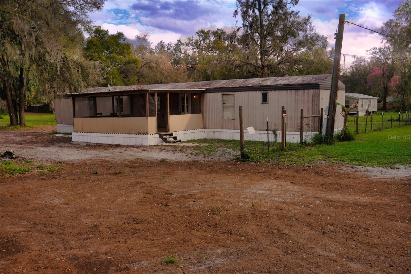 ***Cash Buyers / Some Owner Financing Possible / Price Reduction*** Bring your Offers! Check out this unique opportunity to own 1.39 acres of peaceful country living, just 25 miles from Downtown Tampa! This property offers the perfect blend of rural tranquility and city convenience, with easy access to State Road 60, putting shopping, dining, and entertainment just minutes away.
The 3-bedroom, 2-bathroom manufactured home is move-in ready, providing a comfortable living space as-is or a fantastic canvas for renovation. With a little TLC, you can personalize and enhance this home to fit your style. Alternatively, use it as a temporary residence while you design and build the custom dream home you’ve always envisioned.
Ask About Financing Options! There are specialized financing opportunities available for this home
Schedule Your Showing Today! Whether you're looking for space to garden, expand, or create your own private oasis, this versatile property offers room to grow and endless potential!