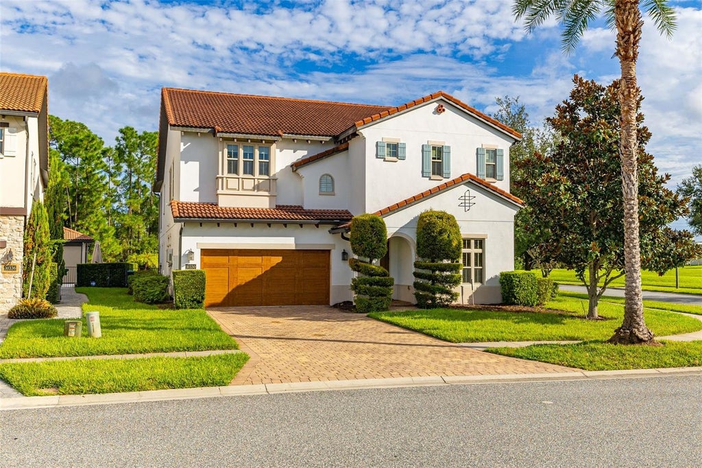 Photo of 10330 Royal Cypress Way, Orlando, FL 32836 (MLS # S5158087)