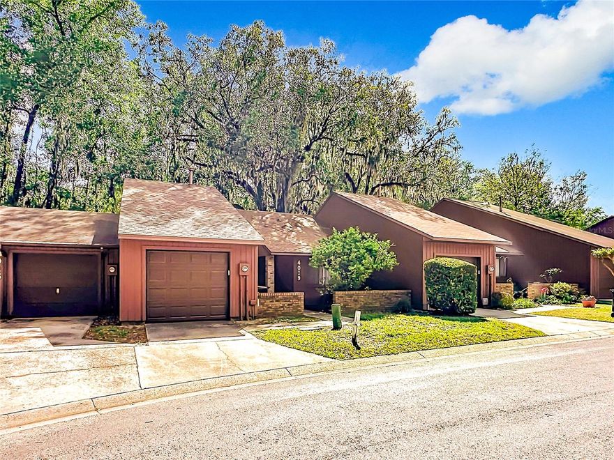 This highly desirable spacious open concept 2 Bedroom (walk-in closets in both) 2 Full Bath Townhome is tucked away in a very quiet neighborhood but yet still close to the heart of NW Gainesville. Features include an attached 1 car garage in Cedar Creek on a cul-de-sac location. New Roof in 2024, new Luxury Vinyl Plank flooring throughout 2024, new expanded Kitchen 2024 featuring new countertops which leads into the vaulted ceiling Living Room w/fireplace that leads to the back screened porch. Please see the attached extensive updates list.  Offering a perfect blend of comfort, low-maintenance living, and modern charm. In-home laundry/mud room is a rare convenient feature. This home is a must-see for anyone looking for one floor living, for a charming starter home or for student/graduate student. The Living Room features a tubular daylight device/Solatube for extra natural lighting. The primary suite with vaulted ceilings has a private attached bathroom and a walk-in closet. On the other side of the home, the second bedroom also with a walk-in closet ensures privacy, making this a perfect layout. The community pool is available for a refreshing swim just a short stroll down the road. HOA takes care of all yard maintenance (excluding flower beds), pest control, and termite treatment, so you can enjoy effortless living. Just a short drive to UF/Shands, NFRMC, and I-75. One of the owners is a licensed Florida real estate agent.