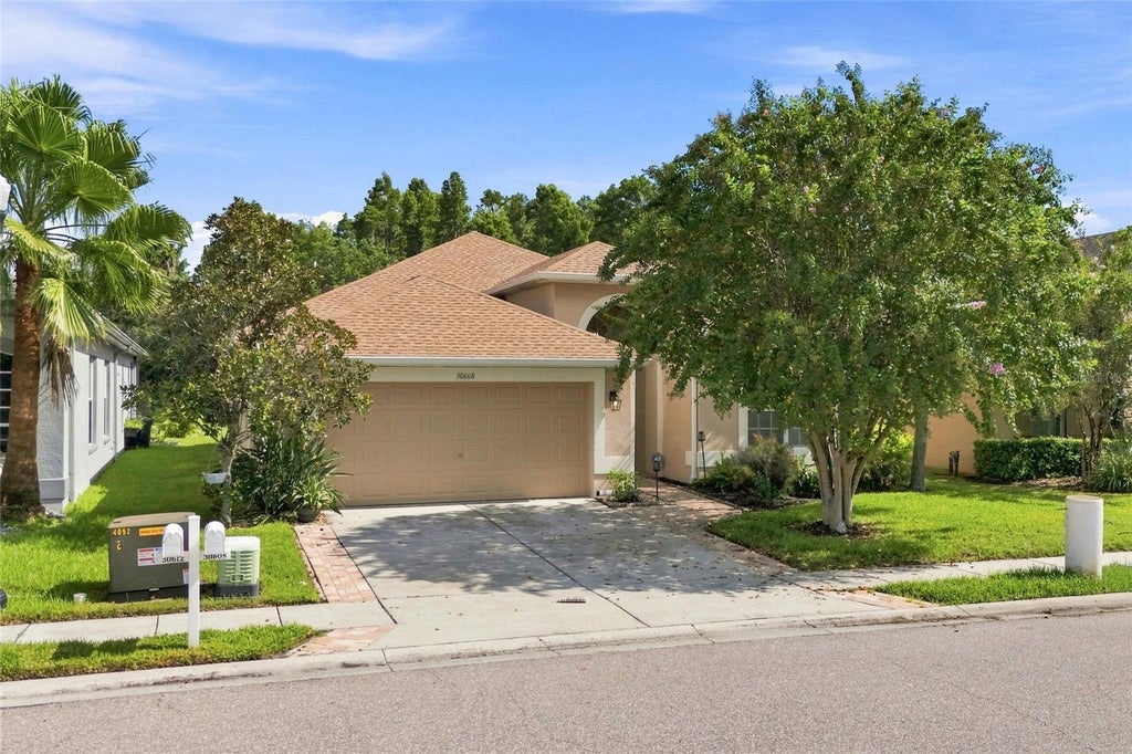 Photo of 30608 Pecan Valley Loop, Wesley Chapel, FL 33543 (MLS # TB8545893)