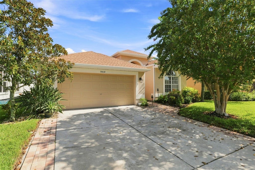 Photo of 30608 Pecan Valley Loop, Wesley Chapel, FL 33543 (MLS # TB8545893)