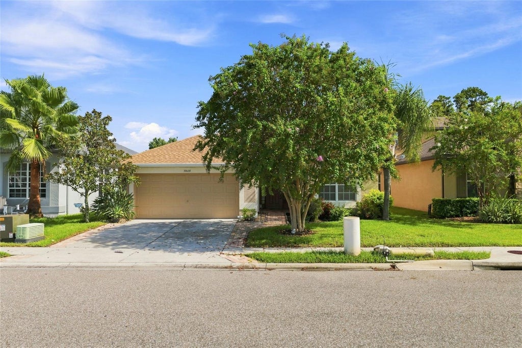 Photo of 30608 Pecan Valley Loop, Wesley Chapel, FL 33543 (MLS # TB8545893)