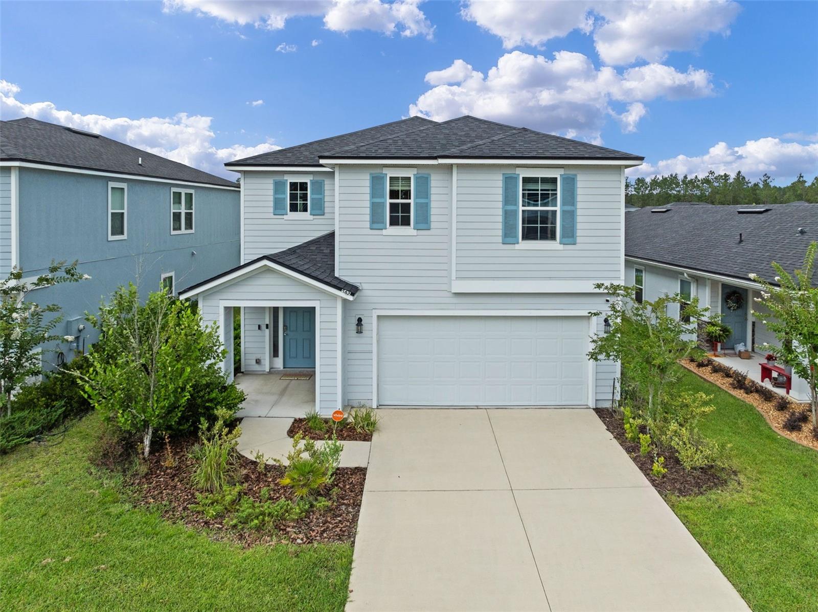 Welcome to your dream home in a charming, tucked-away community! This beautifully designed two-story residence features four spacious bedrooms and three baths, perfect for family living or entertaining guests. Nestled on a serene home site with tranquil water views behind, you'll enjoy peaceful mornings and picturesque sunsets right from your backyard.The main floor boasts an open-concept layout with a bright and airy living room that flows seamlessly into a modern kitchen, equipped with stainless steel appliances and ample counter space, ideal for culinary adventures. A cozy dining area provides the perfect setting for family meals or gatherings with friends. Upstairs, the generously sized loft offers plenty of natural light and comfort, including a luxurious master suite with a private bath and walk-in closet. Each additional bedroom is perfect for family, guests, or even a home office. Step outside to discover your tranquil outdoor oasis, where you can relax on the patio while taking in the beautiful views. The community offers fantastic amenities, including a playground for the little ones and a sparkling community pool for those warm sunny days. Plus, with the nearby beaches and shopping options just a short drive away, you'll have everything you need for a vibrant lifestyle. This lovely home is not just a place to live; it's a lifestyle waiting for you to embrace. Don’t miss the chance to make it yours!