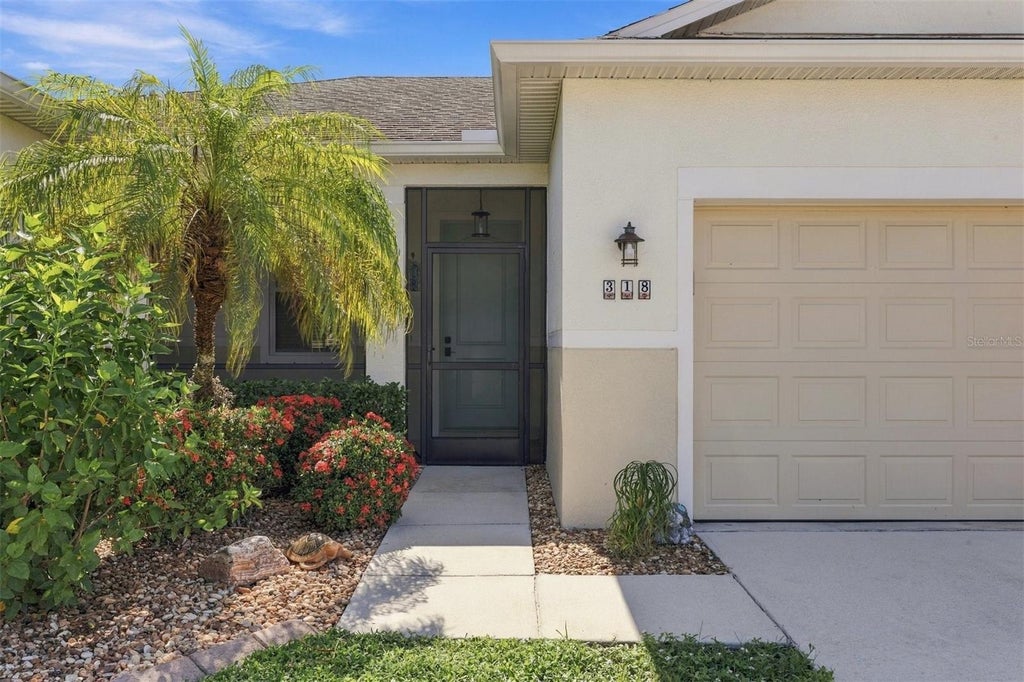 Photo of 318 65th Avenue E, Bradenton, FL 34203 (MLS # A4709935)