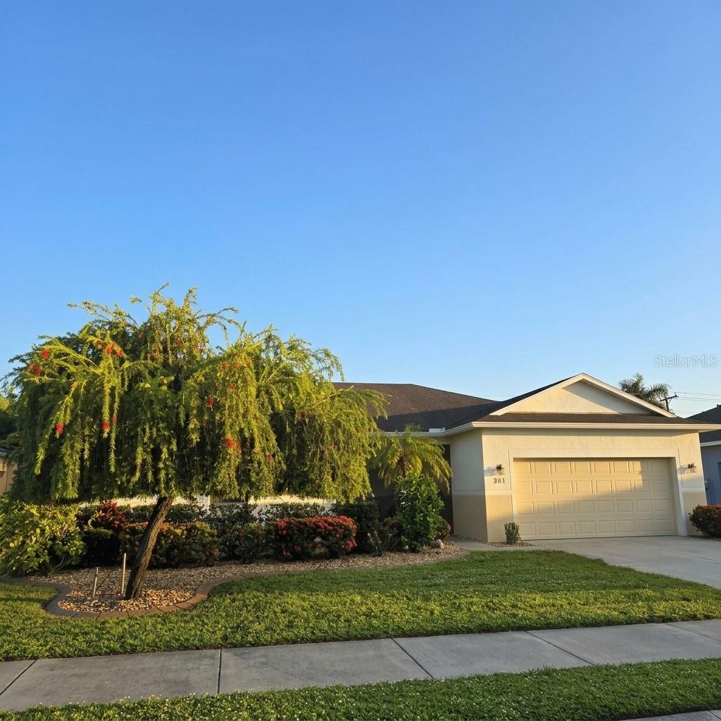 Photo of 318 65th Avenue E, Bradenton, FL 34203 (MLS # A4709935)