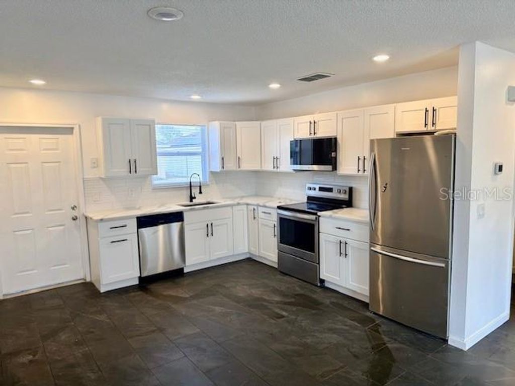 Photo of 344 Edgewood Court, Kissimmee, FL 34759 (MLS # S5144795)