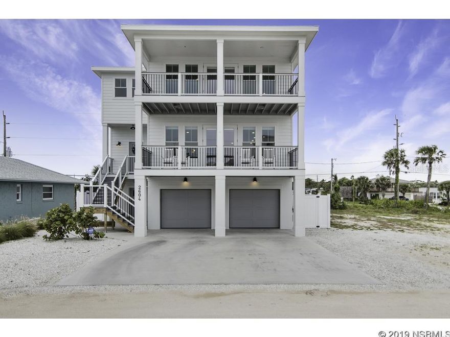 The waves are only steps from your door!  This newly custom built, ocean view, pool home, features 5 bedrooms and 4 full bathrooms.  This coastal contemporary style home is a low maintenance property. Whether you are looking for a full time residence, weekend beach house, or income producing property, this house is perfect for any buyer.  The first floor guest suite includes a partial kitchen and laundry room.  The second floor's open floor plan has a custom kitchen with Quartz countertops, fireplace and a front porch balcony perfect for a cup of coffee and a good book.  The third floor consists of 3 bedrooms, which include the master suite with breathtaking views and a bathroom that will make you feel like royalty.  The home contains solid wood floors reclaimed from the famous Belleview Biltmore Hotel in Clearwater built in 1897.  The pre-constructed elevator shaft is pre-wired and ready for a car.  Located in the short-term rental zone, this house is a must see.  Make an appointment today! ;Water: City