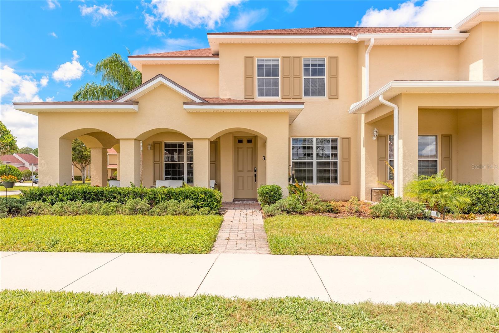 Welcome to your new home in Venetian Bay, one of the area's most sought-after master-planned communities! From the moment you step inside, you'll be greeted by soaring ceilings, upgraded luxury vinyl flooring, and a bright, open layout that feels light, airy, and inviting. The spacious living room opens seamlessly into the heart of the home, a kitchen designed to impress. Here you'll find sleek granite counters paired with crisp white cabinetry, two bar islands, a large black composite farm-style sink, and stainless steel Samsung appliances. With plenty of cabinets for storage, a formal dining area, and sliding glass doors that lead to the back patio, this kitchen and dining setup is truly perfect for gathering and entertaining. A convenient flex space downstairs offers the ideal spot for an office or reading nook, while a half bathroom and inside laundry room with cabinetry and a utility sink add practical touches. Upstairs, both bedrooms feature their own private bathrooms for comfort and privacy. The main bedroom is highlighted by elegant double doors and an upstairs nook that's perfectly sized for a desk or sitting area. Outside, the home continues to impress with a paver driveway, spacious two-car garage with additional rear parking, and low-maintenance living at its best. HOA dues cover lawn care, exterior maintenance, roof, and even pressure washing, giving you more time to enjoy the lifestyle Venetian Bay is known for. Stroll through neighborhood parks, relax at the community pool, or take advantage of optional upgrades like the fitness center, clubhouse bar, and award-winning golf course, all just minutes from your door. This townhome blends modern comfort with effortless living and resort-style amenities, making it the perfect place to call home. All information deemed accurate but cannot be guaranteed. New Roof, HVAC 5 years old, hot water heater 2025.