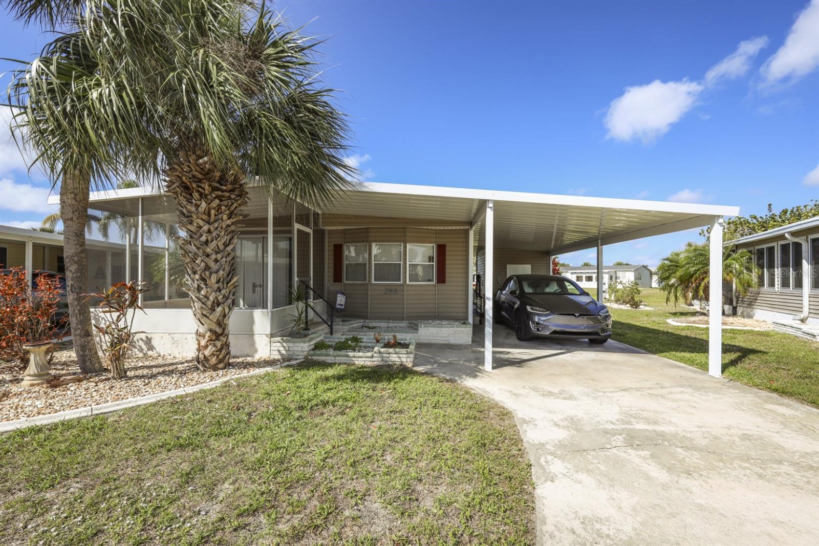 This 1978 home on a premium interior lot is ready for your modern touch with endless potential. Located in Maple Leaf Golf & Country Club, a vibrant active 55+ community. This charming 2 bedroom, 2 bathroom home is located only two tenths of a mile from the country club, pro shop and more. Take advantage of the 120sq ft front screened lanai to watch the sunrise or the open air covered back patio for the sunsets. The rear patio overlooks serene greenspace and features a peaceful water view, making it an ideal spot to relax. The 64sq ft storage shed is conveniently located within the carport, equipped with a washer and dryer and ample storage space to keep your pool and beach gear, as well as your golf clubs neatly organized and easily accessible. **Be sure to check out the 3-D virtual tour and walk through video links** Located in award winning Maple Leaf Golf & Country Club, a popular 55+ gated golf course community with an active resort lifestyle. Features a Par 62, 18 hole golf course, 5 tennis courts, bocce ball, lawn bowling, 2 shuffleboard courts, 4 heated swimming pools, 2 hot tubs, fitness facility, woodworking facility, 75+ clubs/activities, 4 pickleball courts, restaurant with full service bar, tiki hut/bar and more. Don't miss out on this opportunity to live in a thriving community where every day feels like a vacation. It's true what they say, it's all about the lifestyle.