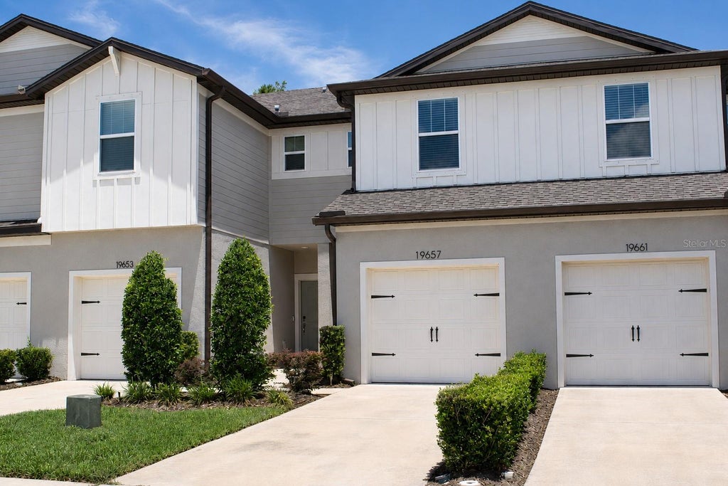 Photo of 19657 Shady Oak Drive, Land O Lakes, FL 34638 (MLS # TB8533237)