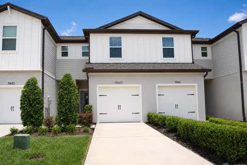 Photo of 19657 Shady Oak Drive, Land O Lakes, FL 34638 (MLS # TB8533237)
