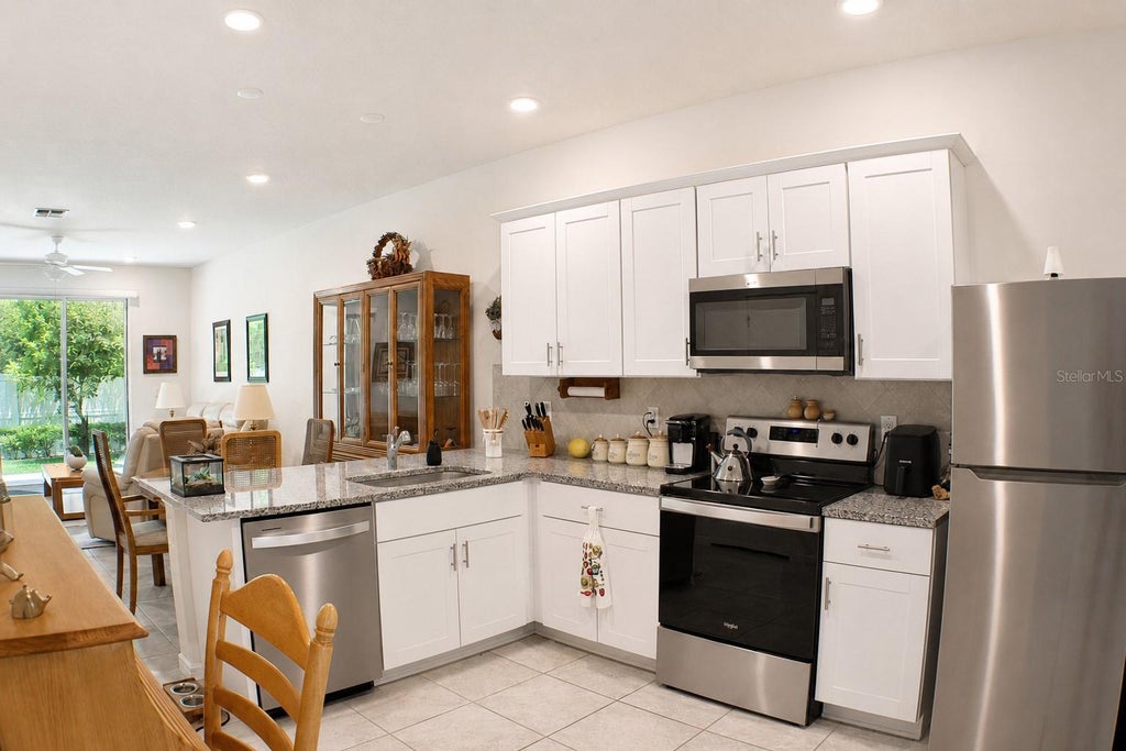Photo of 19657 Shady Oak Drive, Land O Lakes, FL 34638 (MLS # TB8533237)