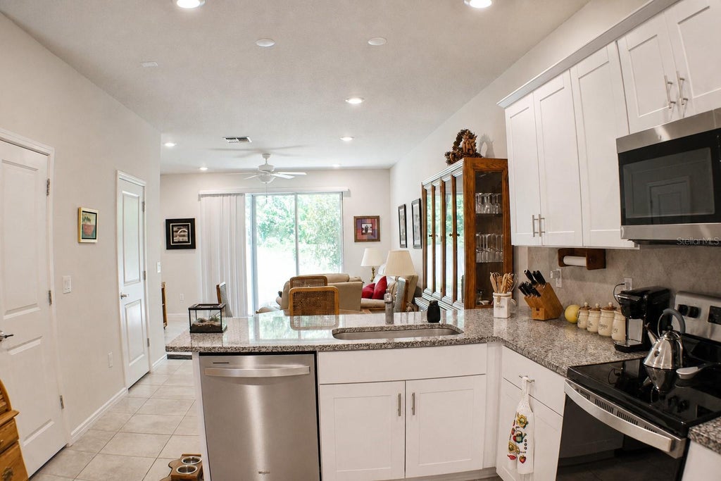 Photo of 19657 Shady Oak Drive, Land O Lakes, FL 34638 (MLS # TB8533237)