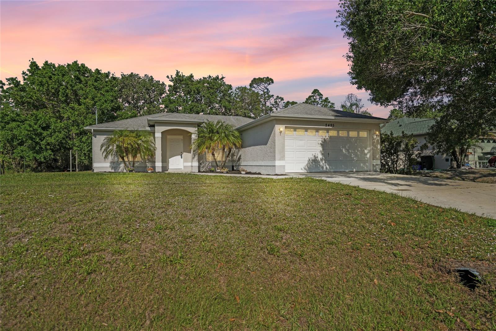 Your Next Chapter Starts at 2495 De Garmo St! This 3-bedroom, 2-bathroom home in North Port, Florida, offers 1,252 square feet of opportunity, complete with a 2-car garage for your vehicles or extra storage. Freshly painted and brimming with potential, it’s the perfect find for investors or first-time buyers looking to craft a cozy home or a smart rental in a market on the rise.
Located in the thriving North Port community, you’re close to everything that matters. Explore nature at Myakkahatchee Creek Environmental Park, unwind at the soothing Warm Mineral Springs, or enjoy a round at Heron Creek Golf & Country Club—all just a short drive away. Everyday needs are met with ease at Cocoplum Village Shops, and families will appreciate nearby schools like Cranberry Elementary. Plus, the beautiful beaches of Englewood or Venice are only 20-30 minutes from your doorstep.
Priced to move, this home is ready for your personal touch. Don’t wait—schedule a showing today and see how this North Port find can become your perfect fit!