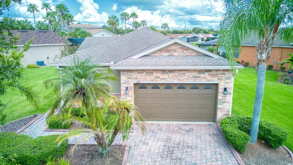 This Cabernet model is priced to sell. This home is turnkey fully furnished. Boasting an oversized lot that backs up to water and steps away from the community pool and clubhouse. This home has 2 bedrooms and 2 baths. The Dining and living room has vinyl plank flooring.The exterior was painted in 2021 and has stone facade. The A/C was replaced in 2019 and has a UV Filter in the system. A fence is installed around the rear of the home. This home is move in ready with many upgrades. Solivita is a gated and guard-monitored 55+ master-planned community situated on 4,300 acres and boasts 150,000 square feet of resort-style amenities such as golf, 2-18 hole Golf courses, 2 state-of-the-art fitness centers, and various dining options. Residents can also enjoy 14 heated pools, amenity complexes, neighborhood centers, pickleball, tennis, bocce, and shuffleboard courts, along with miles of walking and bike paths. Over 200 Clubs, with Art, Education and cultural classes for you to enjoy! Join the "Solivita Family" and make this home your home today! Just outside of Solivita is a state are Hospital and many doctors's offices. Also just outside of the gate is the new Poinciana Lakes shopping center with Outback, First Watch, Sprouts Market, Ross, Burlington, Bojangles, Sage Dental, TD bank, 5 below, Petco, Five Guys and many more.