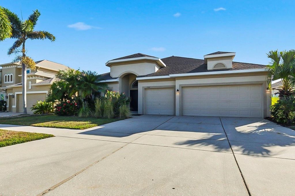 Photo of 1762 Mira Lago Circle, Ruskin, FL 33570 (MLS # O6340639)