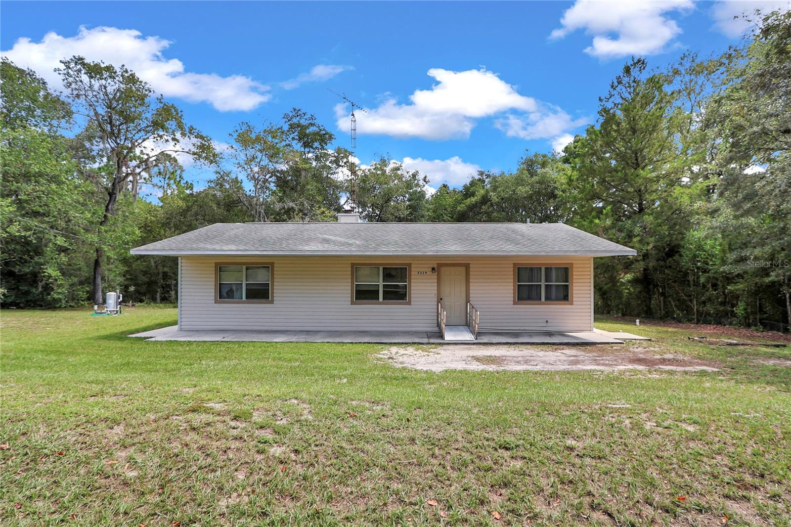 *DEAL ALERT* Country Cottage Charm Meets Florida Lifestyle in Dunnellon! *DISCOVER your private retreat tucked away in the heart of Dunnellon, FL! This well-maintained 3-bedroom, 2-bathroom "Cabin in the Woods"-style home sits on 1.88 acres of A2-zoned land ideal for those dreaming of a relaxed, rural lifestyle with room for Horses, pets, or even chickens. With just the right balance of country charm and modern convenience, this is a rare opportunity to enjoy "the best of both worlds" on a budget.
*LOCATION, LIFESTYLE & FREEDOM: Nestled just minutes from: Rainbow Springs State Park, The famous KP Hole Tubing or
kayaking the crystal-clear Rainbow River. Waterfront dining, shopping, entertainment & medical services close by. Miles of scenic walking and biking trails And just 25 miles to the Gulf for world-class boating, fishing, and unforgettable sunsets over open waters.
*PROPERTY HIGHLIGHTS: 2012 NEW HVAC, 2012 NEW ROOF. Vintage river rock wood-burning fireplace in a cozy, open-concept living area, split bedrooms privacy. En-Suite Master bedroom Front porch perfect for "Sippin' and Sittin' " while soaking in Blood Orange sunsets. Plenty of room for your dream garden, a custom BBQ area, or future swimming pool.
*BONUS BUYER INCETIVES: ? Seller is offering up to $2,000 in concessions toward an interest rate buy-down, prepaids, or closing costs, making this an even more attractive deal for smart buyers. If this sounds like it's calling your name don't wait!