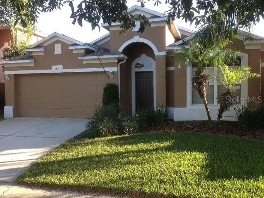 An amazing opportunity has become available for you to become a resident of the guard-gated Stoneybrook West Golf Community. This pool home is located on a less travelled road to enjoy minimal traffic and peace and quiet. Get ready for the magic to begin with an amazing formal living room and dining room. The home then opens into the gourmet kitchen which will impress the chef of the family. A nice family room completes this area that leads to the pool. The backyard is a true highlight, featuring a spacious area, and screened private pool. Lush landscaping surrounds a generous green space, perfect for your enjoyment. An extended patio providing ample outdoor living space. When you’re ready to retire for the evening, this large, 4-bedroom split place allows everyone to have their privacy. Living in the Stoneybrook West community means enjoying resort-style amenities, including a community swimming pool, golf courses, a clubhouse with a fitness center, tennis courts, a pickle ball court, an inline skating rink, and basketball courts. Basic cable and internet are included in the HOA package. In addition to these amenities, the neighborhood is home to highly rated schools, with Whispering Oaks Elementary conveniently located just across the street from the main entry gate. Winter Garden offers excellent shopping and dining options at the Winter Garden Village Mall and nearby areas, with the trendy historic downtown Winter Garden and the West Orange bike trail just a short drive away. Make your private appointment today, while the opportunity still exists.