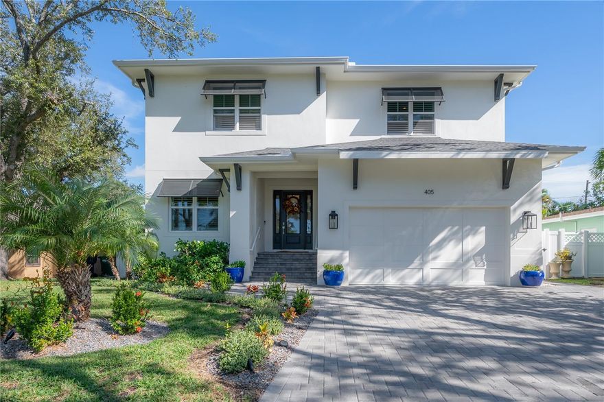 Welcome Home! Built in 2020 by TB Homes, this masterpiece boasts a total of five (5) bedrooms, four and a half (4.5) bathrooms, a media room, and a spacious den/office. As you step inside this magnificent British West Indies-style home, you'll instantly be captivated by its stunning design and luxurious finishes. The open floor plan, beautiful hardwood flooring, and cozy lighting provided by stunning light fixtures create an inviting atmosphere that exudes comfort and warmth.  On the first floor, you'll find a large den/office with chair rail molding and French doors, an expansive great room with surround sound for the ultimate movie night, and a perfectly appointed guest suite that can also serve as the pool bath. The covered outdoor patio is perfect for al fresco dining or relaxing, while the two-car garage has upgraded ceiling storage and shelving systems. The chef's dream kitchen features state-of-the-art Viking appliances, a Sub-zero refrigerator, an oversized waterfall island with a breakfast bar, a large walk-in pantry, an under-counter ice machine, a pot filler, and custom cabinetry with under-mount lighting and upgraded hardware. The built-out Butler's Pantry with glass cabinetry and a wine fridge is perfect for entertaining guests as you host them in the dining room filled with natural light and features awe-inspiring coffered ceilings and elegant wainscoting wall detail. Upstairs, you'll find a spacious main bedroom suite with a magnificent marble-clad bathroom, complete with dual sinks, with an expansive shower. The fully built-out closet systems and spectacular marble-clad main bathroom make the suite a true oasis. Additionally, the second floor features jack-n-jill bedroom suites with tile floors in the bath, an ensuite bedroom with gray penny tiles, a large laundry room with cabinetry and sink, and a fantastic media room with built-in cabinets and refrigerator to store your popcorn and drinks.  Located in the highly sought-after Plant High School district, this home is close to all of the lovely shops and restaurants Davis Islands offers. Plus, you can enjoy all the other South Tampa and Downtown luxuries just minutes away. This home is truly a dream come true, offering the perfect blend of luxury, comfort, and convenience. Bedroom Closet Type: Walk-in Closet (Primary Bedroom).