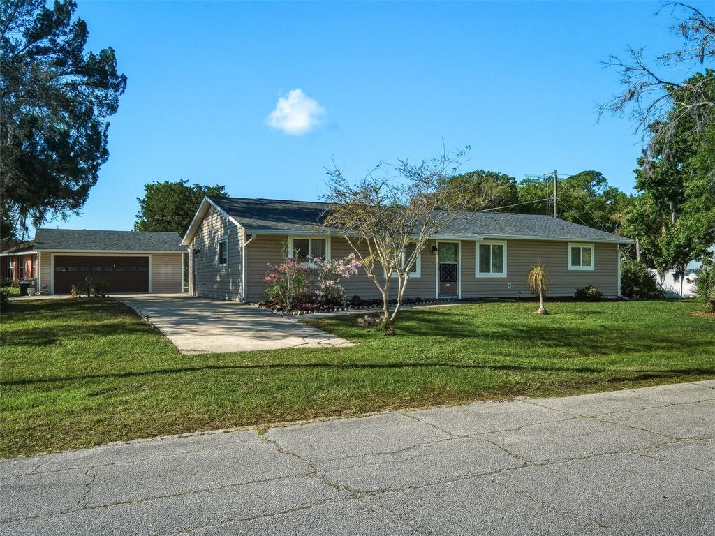 Photo of 1214 Victory Palm Drive, Edgewater, FL 32132 (MLS # NS1087668)