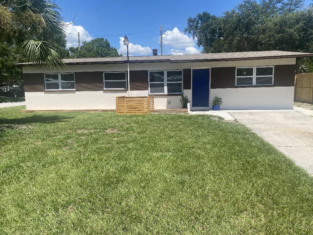 Great opportunity to own a newly remodeled / updated home that was tastefully redone . This home sits on a corner lot that has 2 separate driveways one in the front of the home and one on the side rear of home ! It is perfect for a trailer , RV or Boat storage . This is a ranch style home with all craftsman wood touches / trim throughout . This split plane home is very spacious with a great flow throughout . Beautiful new kitchen and bathrooms, everything new and never used . Beautiful new waterproof vinyl engineered floors that flow seamlessly throughout the whole house . outside was updated with new stucco with sand finish over block to give the home a great new fresh updated look, then freshly painted . the interior was compleaty repainted as well . if your looking for a home that looks , smells and feels like new this is the house for you . this home is move in ready and new buyer will have peace of mind and not have to worry about any need repairs in the near future . This home has two separate living rooms on both sides of the kitchen making it a great place to host family gatherings / parties. One of the living rooms has a beautiful wood burning fireplace that adds great warmth and character . There is also a beautiful large Florida covered sunroom in the back of home that is screend in and also has glass window Paynes so it can be closed off from weather The Roof was replaced 2025 water heater replaced 2025 and lots more! too much to list call for more info . this home is centrally located and close to everything ! 10 min or less to airport , malls , stadium and Lots of restaurants and grocery stores 3 min away and much more .